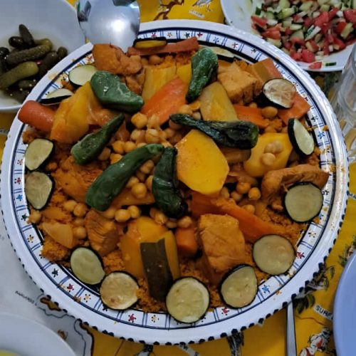 Preparing a Delicious Tunisian  Couscous Dish with Cure All & More Extra Virgin Olive Oil